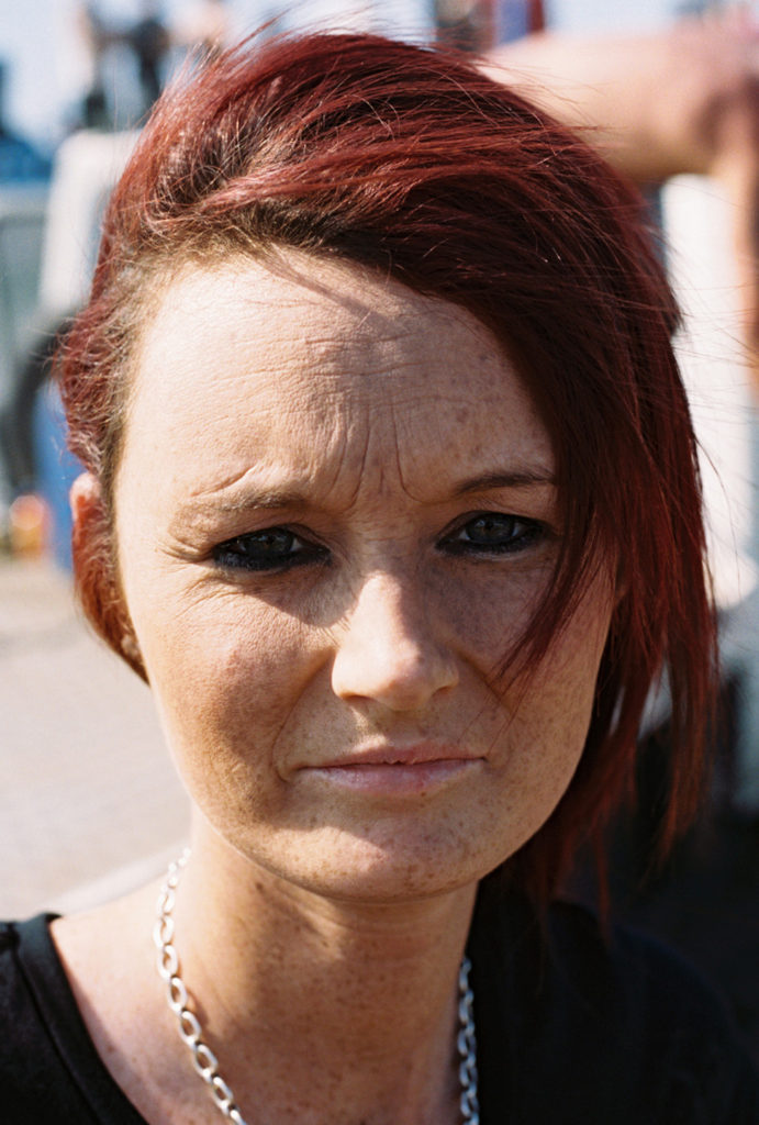 head shot women red hair banger racing foxhall stadium