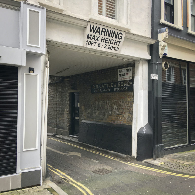 signage old carpenters sign side street portland mews soho london